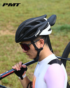 Approved Cycling PMT M-12 helmet, angled view, revealing subtle branding and premium finish