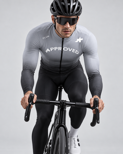 Approved Club Spring/Fall S11 Ice Grey jersey worn by road cyclist — front riding view