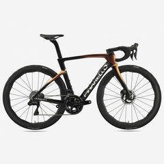 Rear view of Pinarello Dogma F 2025, highlighting seatstay design and rear wheel clearance with Vittoria tires.