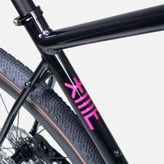 Nich KEM gravel bike, front view, displaying clearance for 50mm tires and multi-mount versatility.