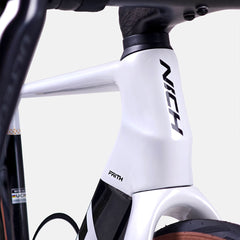 Approved Cycling Nich Faith Road Bike, close-up of front wheel, tire, and thru-axle system