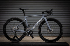 Nich Legend road bike frame, front view, emphasizing the integrated fork and clean lines for optimal aerodynamics.