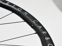 Close-up of the non-drilled tire bed on the Princeton CarbonWorks ALTA 3532 wheels, highlighting tubeless readiness.