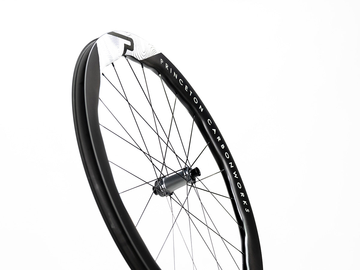 Approved Cycling Princeton CarbonWorks Dual 5550 Evolution wheels, showcasing aerodynamic rim profile.