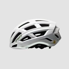 Rider wearing PMT Elegant MIPS helmet, on-bike view. Demonstrates comfortable fit and minimalist aesthetic.