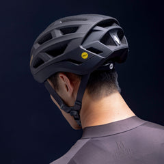 PMT Elegant MIPS helmet, showing chin strap and buckle. Secure and easily adjustable for precise fit.