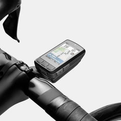 Integrated Wahoo ELEMNT BOLT V3 head unit on road bike handlebars, highlighting aerodynamic mount.