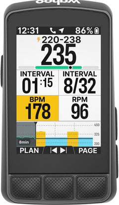 Wahoo ELEMNT BOLT V3 bike computer beside USB-C cable and mounts, illustrating included accessories.