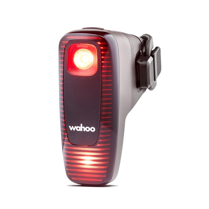 Wahoo TRACKR Radar mounted on a road bike seatpost, showing its compact design and integrated tail light for rear visibility.