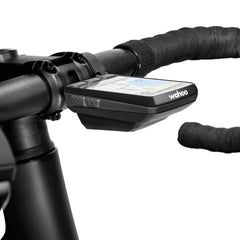 Detail view of Wahoo ELEMNT Roam V3 bike computer highlighting the tactile buttons and secure USB-C charging port.