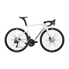 Low-angle shot of Pinarello F3 road bike, illustrating aerodynamic fork and precise handling capabilities.