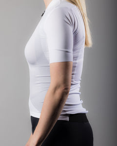 Approved Cycling Women's Fundamental LTD. jersey, close-up of precision Swiss craftsmanship.