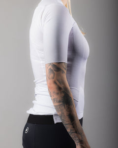 Approved Cycling Women's Fundamental LTD. jersey, worn by female rider, in action.